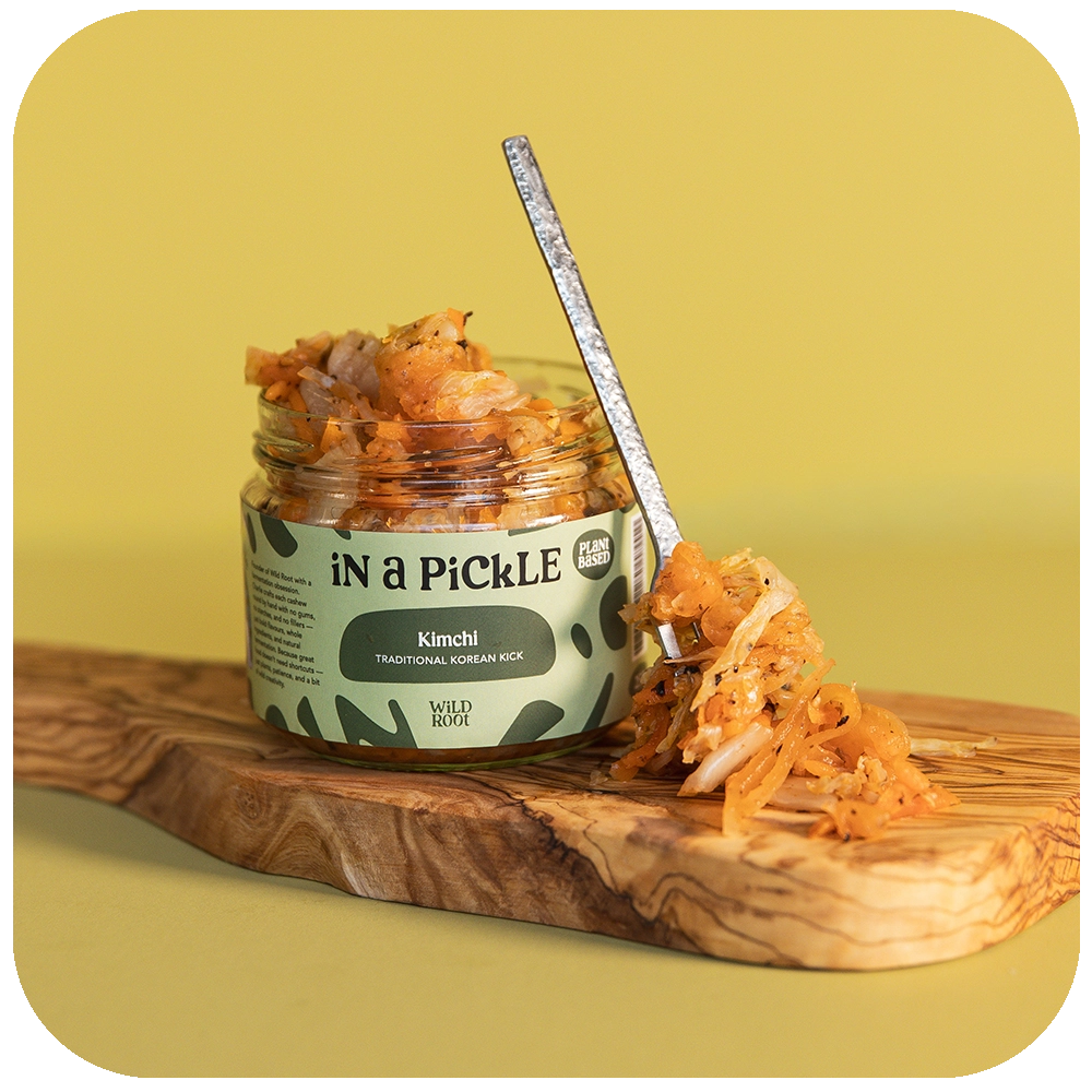 Kimchi jar opened with a spoon