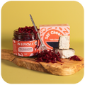 Truffle & Charcoal Cheese and Spicy Beetroot Kraut on a serving board 