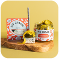 Perfect Pairings: Tangy Blue Cheese and Bread and Butter Pickles on a serving board 