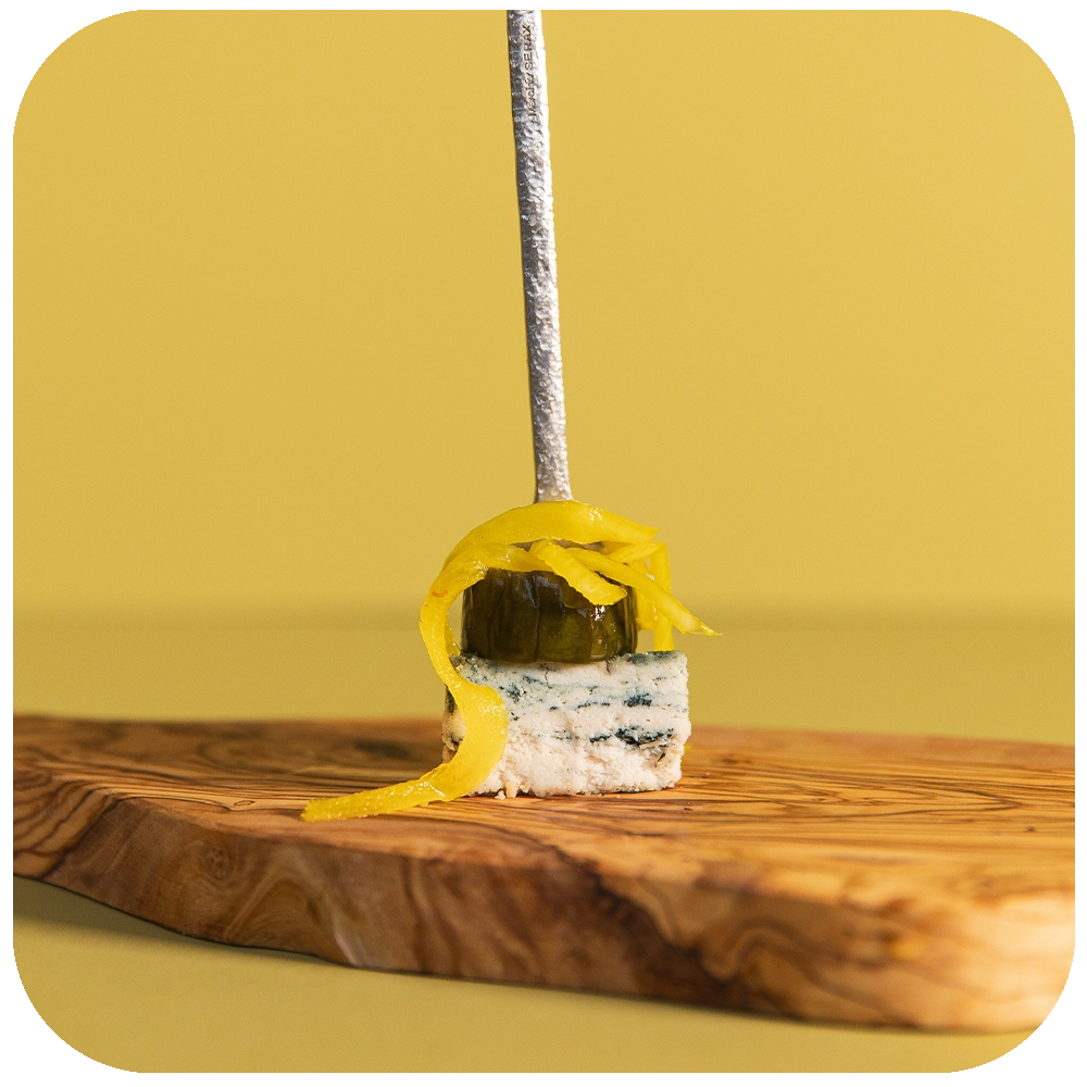 Perfect Pairings: Tangy Blue Cheese and Bread and Butter Pickles on the fork 