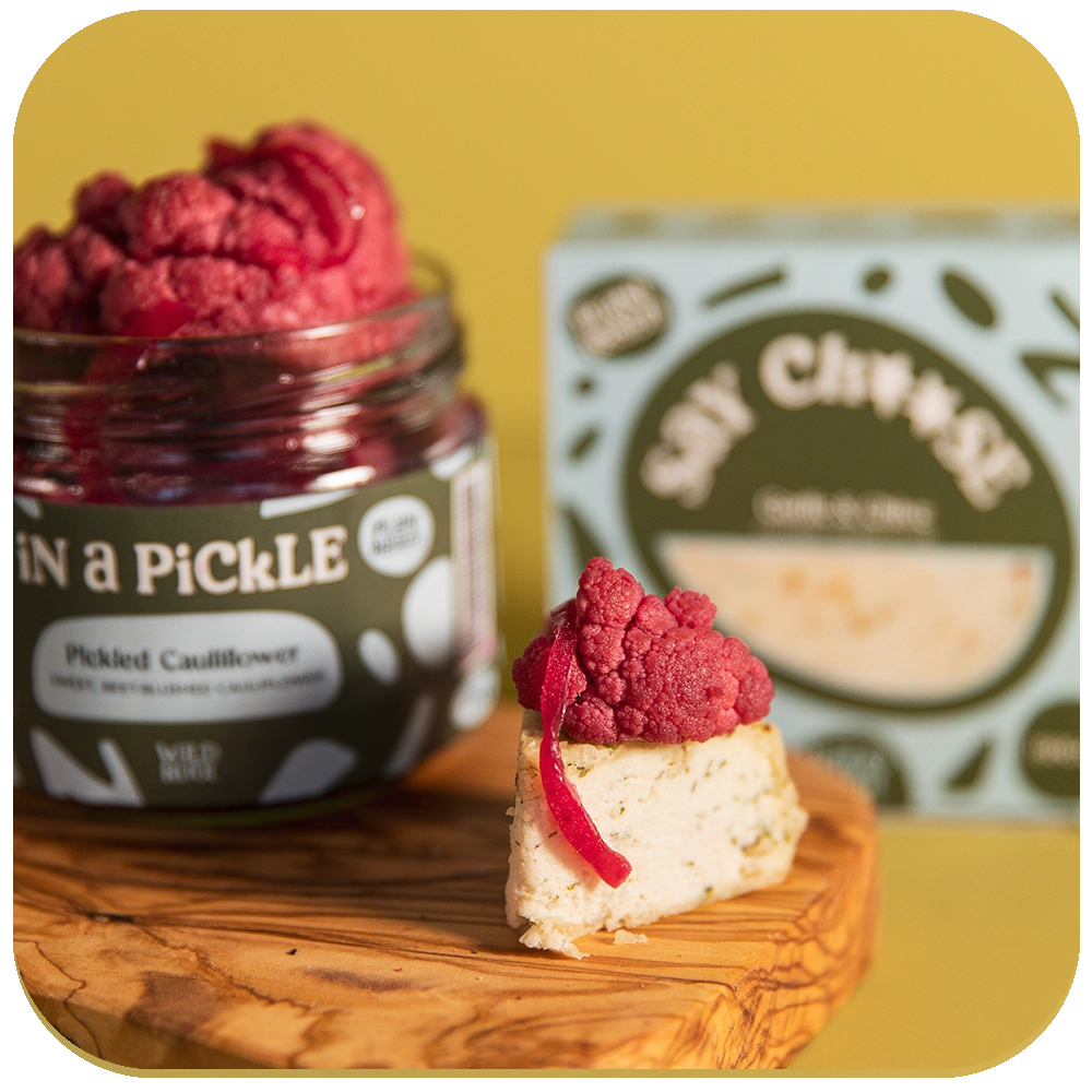 Garlic & Chive Cheese and Pickled Pink Cauliflower on the serving board 