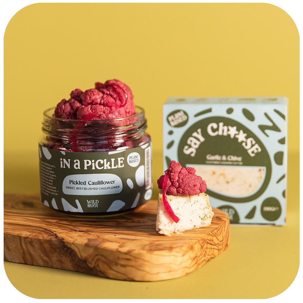 Garlic & Chive Cheese and Pickled Pink Cauliflower on the serving board 